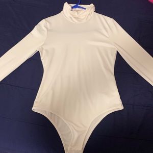 White turtleneck body suit